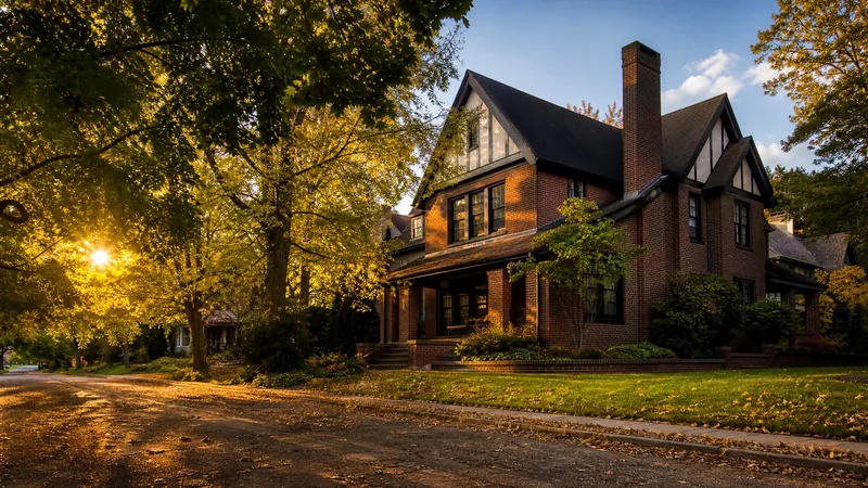 Brick craftsman house on a tree-lined street in golden light, How to Start a Real Estate Brokerage in Michigan